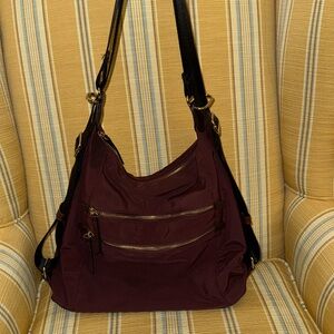 Stylish SIMONS nylon shoulder bag in deep plum. Converts to backpack. Very clean